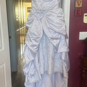 Elegant White Strapless Gown with Floral Detail